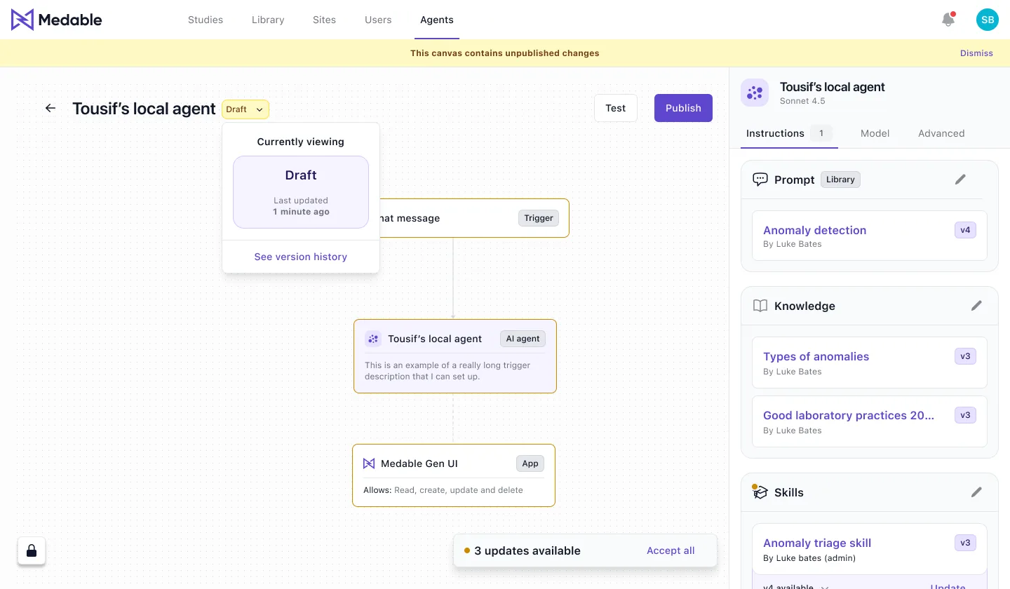 The same canvas after versioning — an unpublished-changes banner, a draft state control, version history, and accent borders on the nodes carrying updates